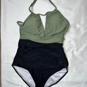 Green and black one piece swimsuit